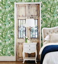 Load image into Gallery viewer, Wallpaper with tropical palm trees in a bedroom